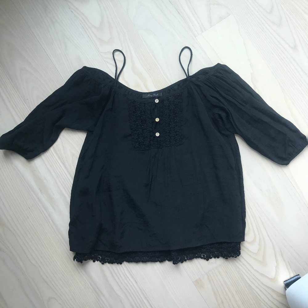 Cold shoulder black top with lace details